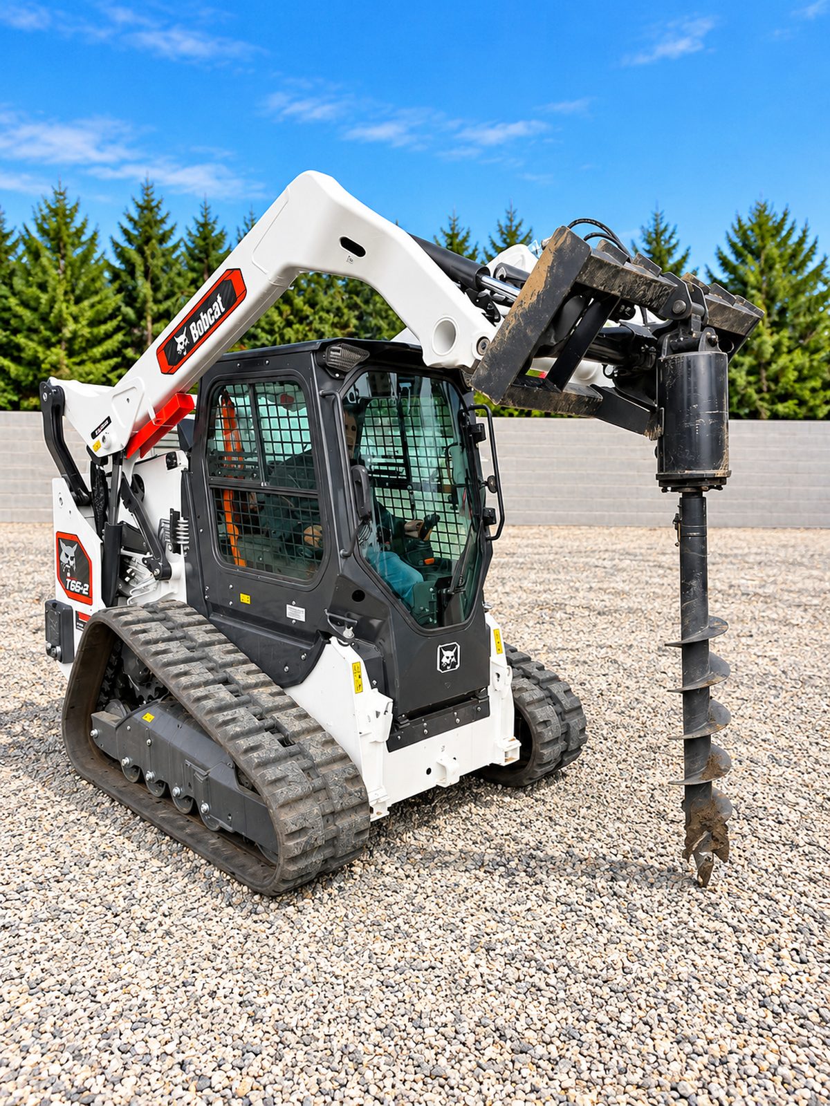 Bobcat T66-2 skid steer with auger attachment for rent from PayLess Equipment Rental LLC